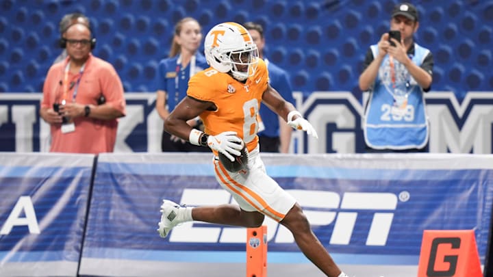 Tennessee defensive back Colton Hood (8) recovers a fumble and runs it into the end zone for a touchdown during the Aflac Kickoff Game between the Volunteers and Syracuse held at Mercedes-Benz Stadium in Atlanta, Ga., on August 30, 2025. Tennessee defensive back Colton Hood (8) recovers a fumble and runs it into the end zone for a touchdown during the Aflac Kickoff Game between the Volunteers and Syracuse held at Mercedes-Benz Stadium in Atlanta, Ga., on August 30, 2025.