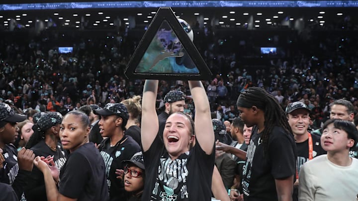 Oct 20, 2024; Brooklyn, New York, USA; New York Liberty guard Sabrina Ionescu (20) celebrates after defeating the Minnesota Lynx in overtime to win the 2024 WNBA Finals at Barclays Center. Mandatory Credit: Wendell Cruz-Imagn Images Oct 20, 2024; Brooklyn, New York, USA; New York Liberty guard Sabrina Ionescu (20) celebrates after defeating the Minnesota Lynx in overtime to win the 2024 WNBA Finals at Barclays Center. Mandatory Credit: Wendell Cruz-Imagn Images