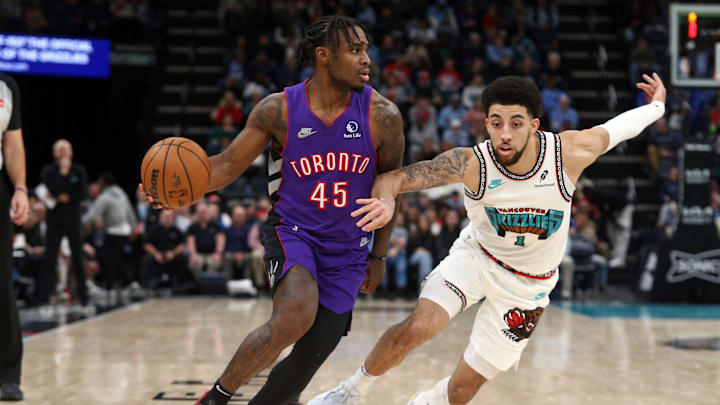 Toronto Raptors guard Davion Mitchell (45) dribbles as Memphis Grizzlies guard Scotty Pippen Jr. (1) defends during the fourth quarter at FedExForum on Dec 26.
