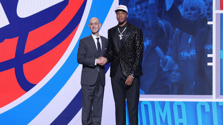 Jun 25, 2025; Brooklyn, NY, USA;  Thomas Sorber stands with NBA commissioner Adam Silver after being selected as the 15th pick by the Oklahoma City Thunder in the first round of the 2025 NBA Draft at Barclays Center. Mandatory Credit: Brad Penner-Imagn Images