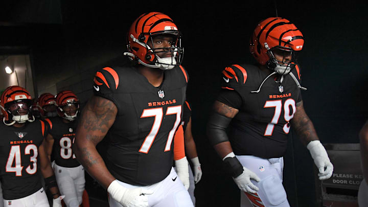 Aug 7, 2025; Philadelphia, Pennsylvania, USA; Cincinnati Bengals offensive tackle Caleb Etienne (77) and offensive tackle Andrew Coker (79) in the tunnel against the Philadelphia Eagles at Lincoln Financial Field. Mandatory Credit: Eric Hartline-Imagn Images