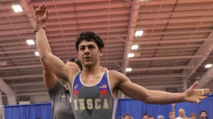 Massachusetts wrestler Musa Tamaradze won his second straight NHSCA wrestling championship, one of three Massachusetts wrestlers to capture titles in the 2025 event.