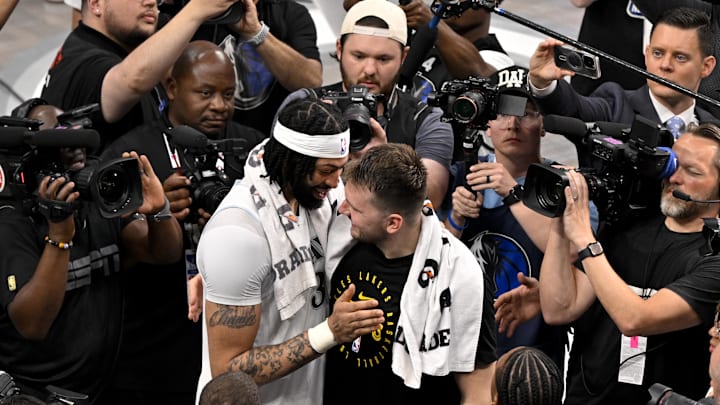 Apr 9, 2025; Dallas, Texas, USA; Los Angeles Lakers guard Luka Doncic (77) and Dallas Mavericks forward Anthony Davis (3) after the game between the Dallas Mavericks and the Los Angeles Lakers at American Airlines Center. Mandatory Credit: Jerome Miron-Imagn Images