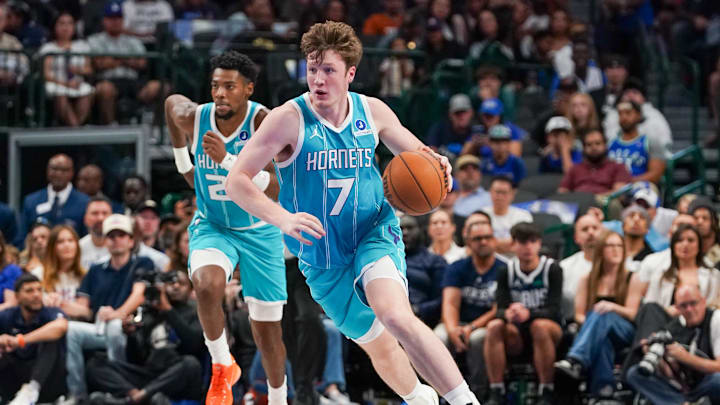 Oct 11, 2025; Dallas, Texas, USA; Charlotte Hornets guard/forward Kon Knueppel (7) dribbles up court in the first half of a game against the Dallas Mavericks at American Airlines Center. Mandatory Credit: Raymond Carlin III-Imagn Images