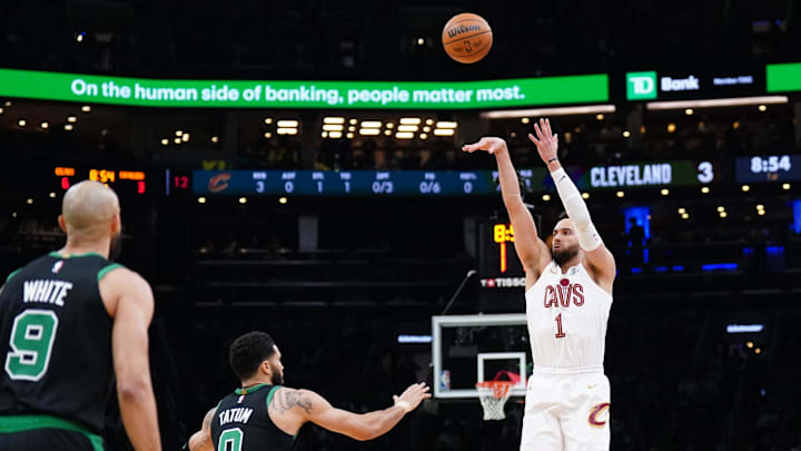 May 15, 2024; Boston, Massachusetts, USA; Cleveland Cavaliers guard Max Strus (1) shoots against Boston Celtics forward Jayson Tatum (0) in the first quarter during game five of the second round for the 2024 NBA playoffs at TD Garden. Mandatory Credit: David Butler II-Imagn Images