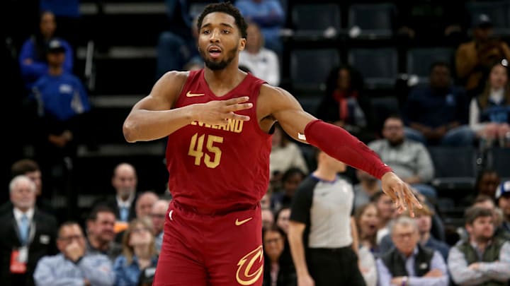 Feb 1, 2024; Memphis, Tennessee, USA; Cleveland Cavaliers guard Donovan Mitchell (45) reacts after a three point basket during the second half against the Memphis Grizzlies at FedExForum. Mandatory Credit: Petre Thomas-Imagn Images