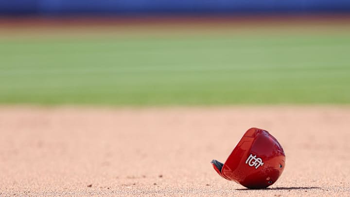 Apr 20, 2025; New York City, New York, USA; The helmet of St. Louis Cardinals right fielder Jordan Walker (not pictured) rests in the base path during the sixth inning against the New York Mets at Citi Field. Mandatory Credit: Vincent Carchietta-Imagn Images