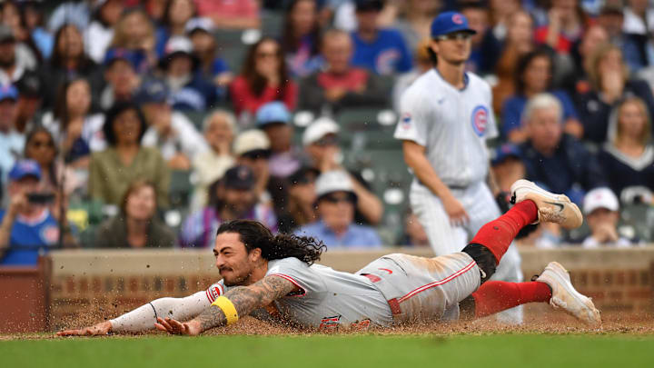 Sep 29, 2024; Chicago, Illinois, USA; Cincinnati Reds second base Jonathan India (6) slides into home plate during the tenth inning against the Chicago Cubs at Wrigley Field. Mandatory Credit: Patrick Gorski-Imagn Images Sep 29, 2024; Chicago, Illinois, USA; Cincinnati Reds second base Jonathan India (6) slides into home plate during the tenth inning against the Chicago Cubs at Wrigley Field. Mandatory Credit: Patrick Gorski-Imagn Images