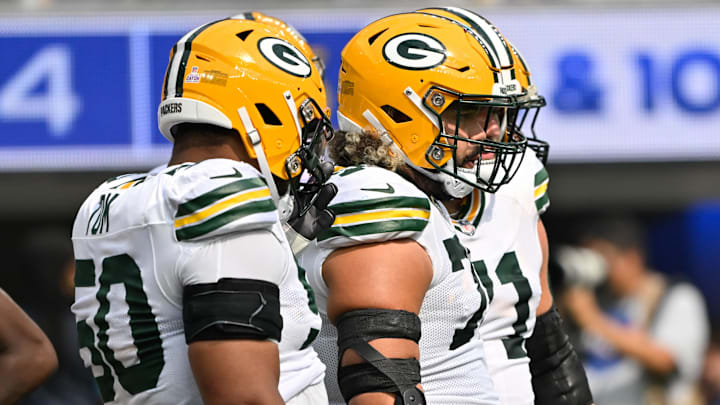 Oct 6, 2024; Inglewood, California, USA; Green Bay Packers guard Zach Tom (50), guard during the second quarter against the Los Angeles Rams Sean Rhyan (75) and center Josh Myers (71) at SoFi Stadium. Mandatory Credit: Robert Hanashiro-Imagn Images