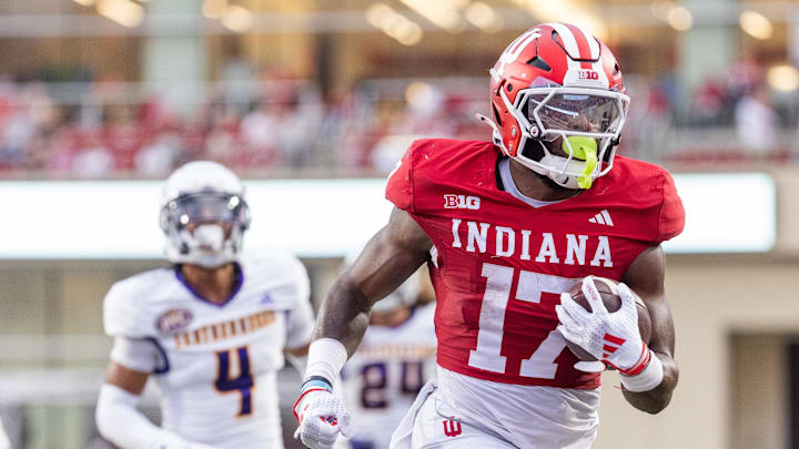 Indiana Hoosiers running back Ty Son Lawton (17) runs the ball for a touchdown in the first quarter against the Western Illinois Leathernecks at Memorial Stadium.