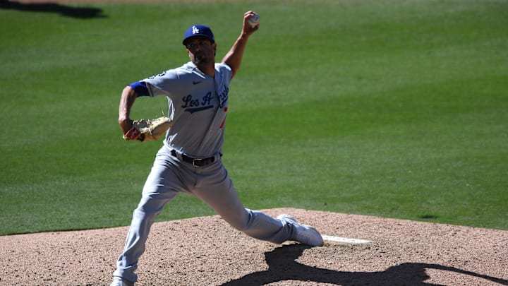 Apr 18, 2021; San Diego, California, USA; Los Angeles Dodgers relief pitcher Scott Alexander (75) pitches against the San Diego Padres during the eighth inning at Petco Park. Mandatory Credit: Orlando Ramirez-Imagn Images