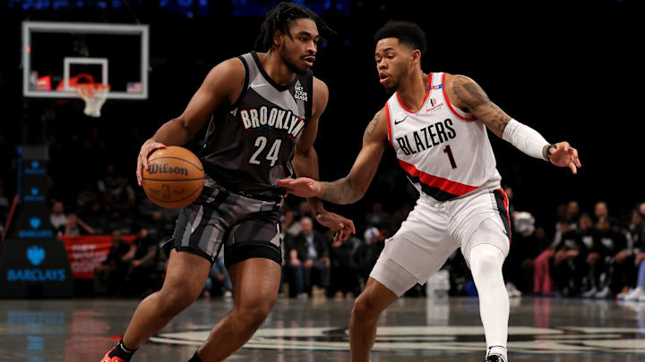 Feb 28, 2025; Brooklyn, New York, USA; Brooklyn Nets guard Cam Thomas (24) controls the ball against Portland Trail Blazers guard Anfernee Simons (1) during the first quarter at Barclays Center. Mandatory Credit: Brad Penner-Imagn Images Feb 28, 2025; Brooklyn, New York, USA; Brooklyn Nets guard Cam Thomas (24) controls the ball against Portland Trail Blazers guard Anfernee Simons (1) during the first quarter at Barclays Center. Mandatory Credit: Brad Penner-Imagn Images