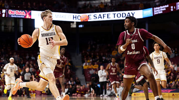 Dec 14, 2025; Minneapolis, Minnesota, USA; Minnesota Golden Gophers forward Cade Tyson (10) drives towards the basket as Texas Southern Tigers guard Alex Anderson (0) defends during the first half at Williams Arena. Mandatory Credit: Matt Krohn-Imagn Images Dec 14, 2025; Minneapolis, Minnesota, USA; Minnesota Golden Gophers forward Cade Tyson (10) drives towards the basket as Texas Southern Tigers guard Alex Anderson (0) defends during the first half at Williams Arena. Mandatory Credit: Matt Krohn-Imagn Images