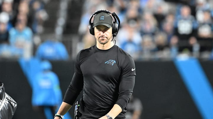Jan 10, 2026; Charlotte, NC, USA; Carolina Panthers head coach Dave Canales on the field in the second quarter in an NFC Wild Card Round game at Bank of America Stadium. Mandatory Credit: Bob Donnan-Imagn Images
