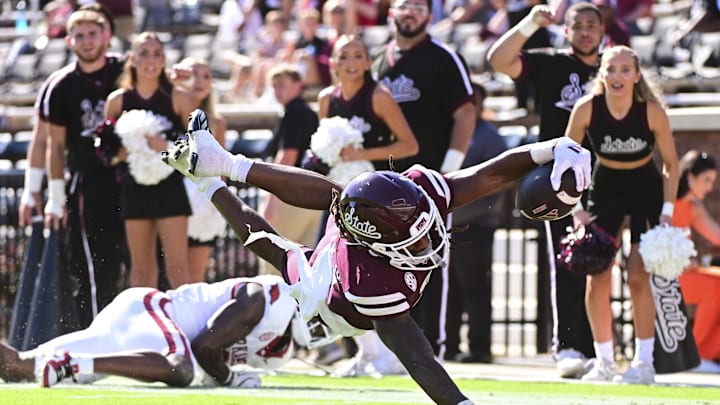 Oct 26, 2024; Starkville, Mississippi, USA; Mississippi State Bulldogs wide receiver Kevin Coleman Jr. (3) dives into the end zone against the Arkansas Razorbacks during the third quarter at Davis Wade Stadium at Scott Field. Mandatory Credit: Matt Bush-Imagn Images