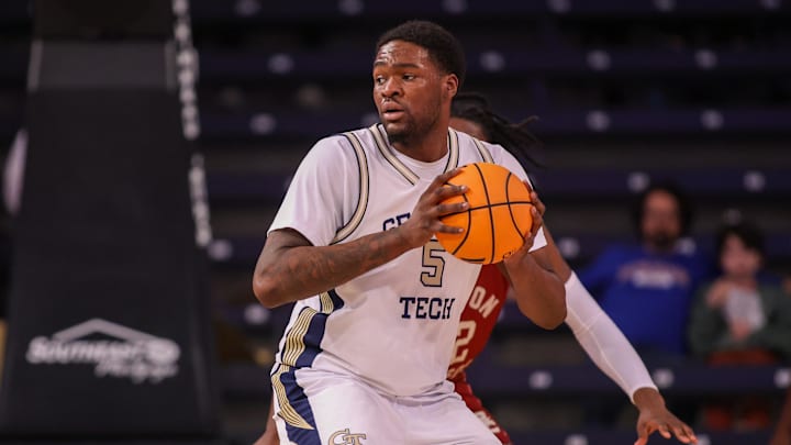 Jan 3, 2026; Atlanta, Georgia, USA; Georgia Tech Yellow Jackets center Peyton Marshall (5) handles the ball against the Boston College Eagles in the first half at McCamish Pavilion. Mandatory Credit: Brett Davis-Imagn Images