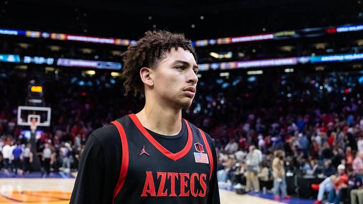 Dec 20, 2025; Phoenix, Arizona, USA; San Diego State Aztecs guard Miles Byrd (21) against the Arizona Wildcats during the Hall of Fame Series at Mortgage Matchup Center. Mandatory Credit: Mark J. Rebilas-Imagn Images
