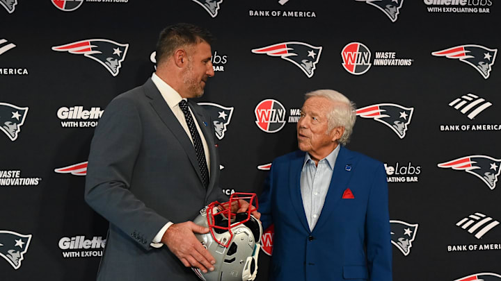 Jan 13, 2025; Foxborough, MA, USA; Mike Vrabel (left) poses for a photo with New England Patriots owner Robert Kraft (right) after a press conference at Gillette Stadium to introduce him as the Patriots new head coach. Mandatory Credit: Eric Canha-Imagn Images
