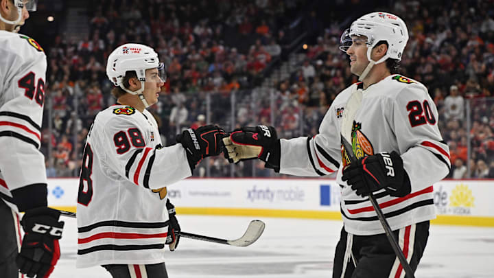Mar 26, 2026; Philadelphia, Pennsylvania, USA; Chicago Blackhawks center Connor Bedard (98) celebrates his goal with center Ryan Greene (20) against the Philadelphia Flyers during the second period at Xfinity Mobile Arena. Mandatory Credit: Eric Hartline-Imagn Images Mar 26, 2026; Philadelphia, Pennsylvania, USA; Chicago Blackhawks center Connor Bedard (98) celebrates his goal with center Ryan Greene (20) against the Philadelphia Flyers during the second period at Xfinity Mobile Arena. Mandatory Credit: Eric Hartline-Imagn Images