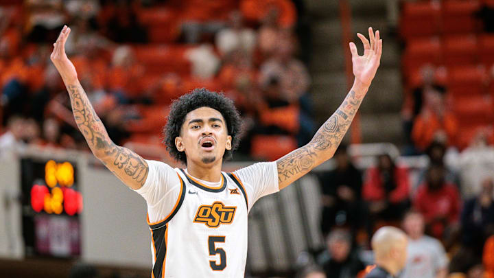 Jan 6, 2026; Stillwater, Oklahoma, USA; Oklahoma State Cowboys guard Vyctorius Miller (5) reacts after a play during the second half against the UCF Knights at Gallagher-Iba Arena. Mandatory Credit: William Purnell-Imagn Images