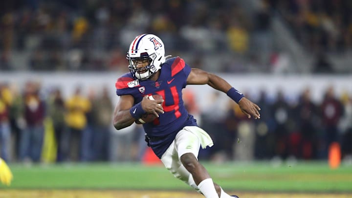 Nov 30, 2019; Tempe, AZ, USA; Arizona Wildcats quarterback Khalil Tate (14) against the Arizona State Sun Devils during the Territorial Cup at Sun Devil Stadium. Mandatory Credit: Mark J. Rebilas-Imagn Images
