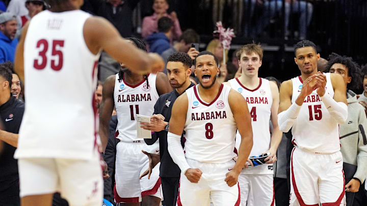 Mar 27, 2025; Newark, NJ, USA; Alabama Crimson Tide guard Chris Youngblood (8) and the Alabama Crimson Tide bench celebrate during the second half against the Brigham Young Cougars during an East Regional semifinal of the 2025 NCAA tournament at Prudential Center. Mandatory Credit: Robert Deutsch-Imagn Images