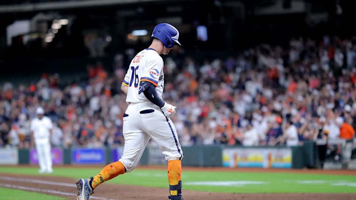 Sep 15, 2025; Houston, Texas, USA; Houston Astros right fielder Zach Cole (16) crosses home plate after hitting a two run home run to right field against the Texas Rangers during the fifth inning at Daikin Park. 