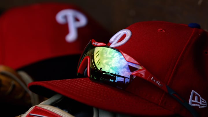 Jul 29, 2018; Cincinnati, OH, USA; A view of the sky and ballpark in the reflection of a pair of sunglasses in the dugout on an official Phillies New Era cap in the game of the Philadelphia Phillies against the Cincinnati Reds at Great American Ball Park. Mandatory Credit: Aaron Doster-USA TODAY Sports Jul 29, 2018; Cincinnati, OH, USA; A view of the sky and ballpark in the reflection of a pair of sunglasses in the dugout on an official Phillies New Era cap in the game of the Philadelphia Phillies against the Cincinnati Reds at Great American Ball Park. Mandatory Credit: Aaron Doster-USA TODAY Sports