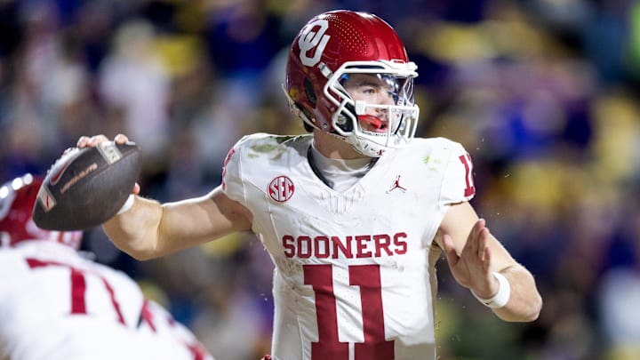 Nov 30, 2024; Baton Rouge, Louisiana, USA;  Oklahoma Sooners quarterback Jackson Arnold (11) passes against the LSU Tigers during the fourth quarter at Tiger Stadium. Mandatory Credit: Stephen Lew-Imagn Images