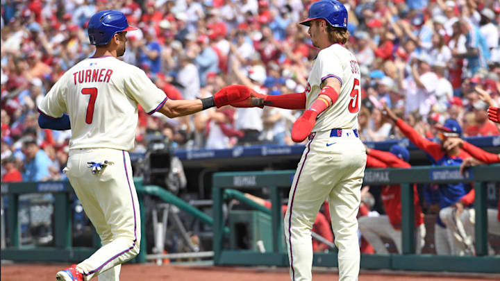 Apr 20, 2025; Philadelphia, Pennsylvania, USA; Philadelphia Phillies shortstop Trea Turner (7) and second base Bryson Stott (5) celebrate after scoring during the first inning against the Miami Marlins at Citizens Bank Park. Apr 20, 2025; Philadelphia, Pennsylvania, USA; Philadelphia Phillies shortstop Trea Turner (7) and second base Bryson Stott (5) celebrate after scoring during the first inning against the Miami Marlins at Citizens Bank Park.