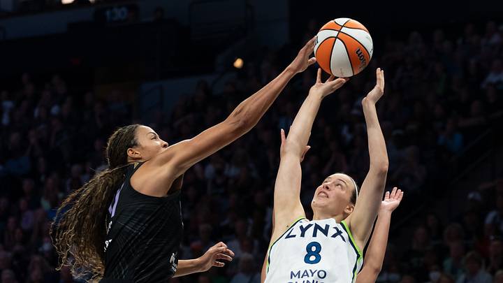 Golden State Valkyries forward Janelle Salaun (13) blocks a shot from Minnesota Lynx guard Antonia Delaere. Golden State Valkyries forward Janelle Salaun (13) blocks a shot from Minnesota Lynx guard Antonia Delaere.