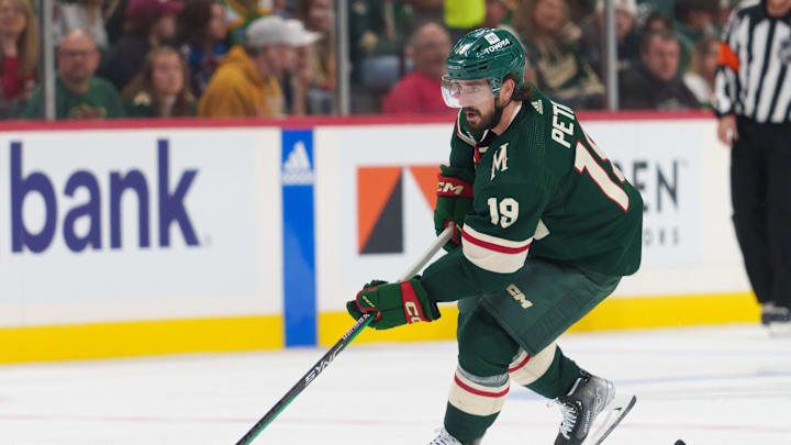 Sep 28, 2023; Saint Paul, Minnesota, USA; Minnesota Wild center Nic Petan (19) skates with the puck