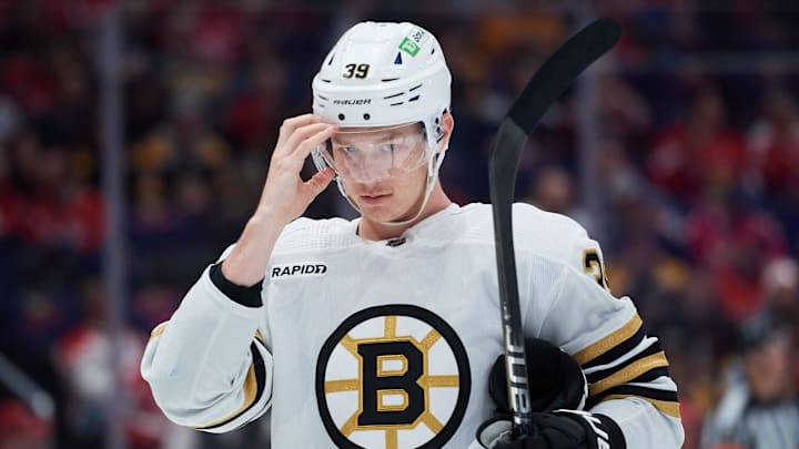 Mar 30, 2024; Washington, District of Columbia, USA; Boston Bruins center Morgan Geekie (39) prepares for a face-off against the Washington Capitals during the first period at Capital One Arena. Mandatory Credit: Hannah Foslien-Imagn Images