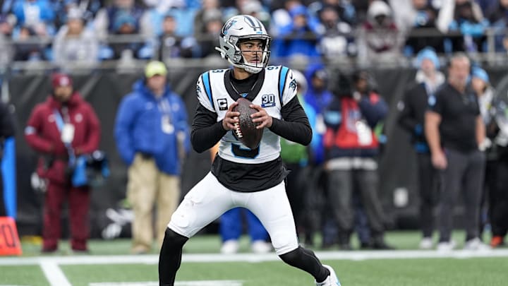 Dec 15, 2024; Charlotte, North Carolina, USA; Carolina Panthers quarterback Bryce Young (9) drops back to pass against the Dallas Cowboys during the second half at Bank of America Stadium. Mandatory Credit: Jim Dedmon-Imagn Images Dec 15, 2024; Charlotte, North Carolina, USA; Carolina Panthers quarterback Bryce Young (9) drops back to pass against the Dallas Cowboys during the second half at Bank of America Stadium. Mandatory Credit: Jim Dedmon-Imagn Images