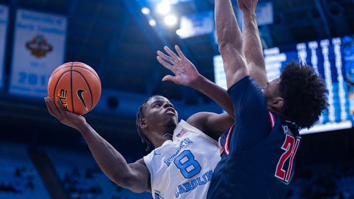 Nov 11, 2025; Chapel Hill, North Carolina, USA; North Carolina Tar Heels forward Caleb Wilson (8) shoots against Radford Highlanders forward Tyson Brown (21) during the second half at Dean E. Smith Center. 