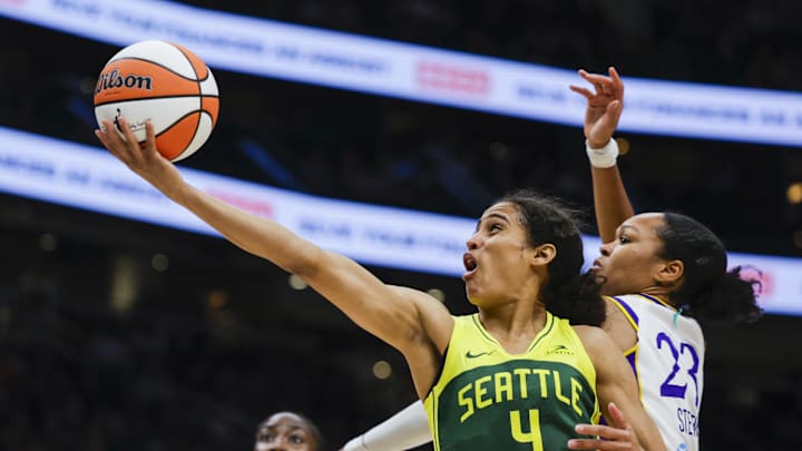 Sep 1, 2025; Seattle, Washington, USA; Seattle Storm guard Skylar Diggins (4) shoots a layup against Los Angeles Sparks forward Azura Stevens (23) during the second quarter at Climate Pledge Arena. Mandatory Credit: Joe Nicholson-Imagn Images