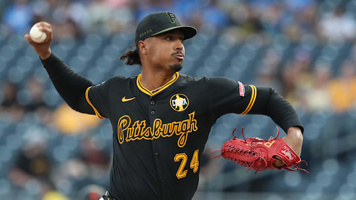 Aug 4, 2025; Pittsburgh, Pennsylvania, USA;  Pittsburgh Pirates starting pitcher Johan Oviedo (24) delivers a pitch against the San Francisco Giants during the first inning at PNC Park. Mandatory Credit: Charles LeClaire-Imagn Images