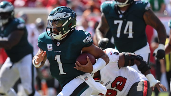 Sep 29, 2024; Tampa, Florida, USA; Philadelphia Eagles quarterback Jalen Hurts (1) runs with the ball against the Tampa Bay Buccaneers during the second half at Raymond James Stadium. Mandatory Credit: Kim Klement Neitzel-Imagn Images Sep 29, 2024; Tampa, Florida, USA; Philadelphia Eagles quarterback Jalen Hurts (1) runs with the ball against the Tampa Bay Buccaneers during the second half at Raymond James Stadium. Mandatory Credit: Kim Klement Neitzel-Imagn Images