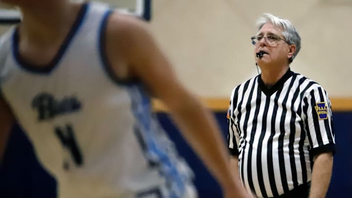 Bob Fuhrman officiates a junior varsity basketball game between Highlands and Burrell Jan. 17 at Burrell High School. One of the 12 rules changes adopted by that National Federation of High Schools was an increased emphasis on flopping. Everyone is still adjusting to the rule change.