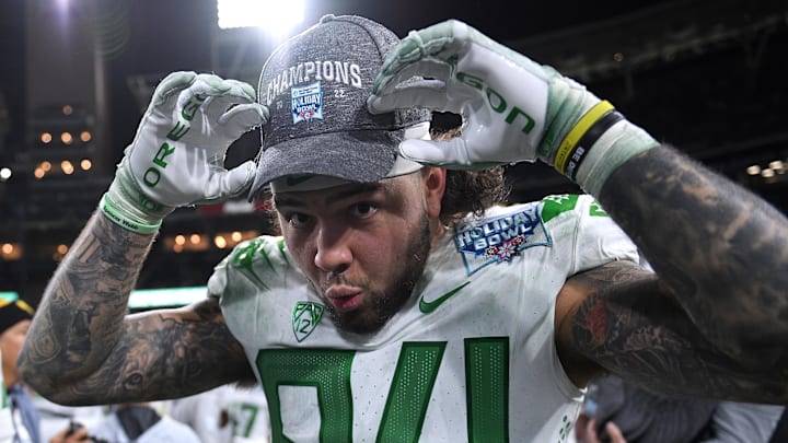 Dec 28, 2022; San Diego, CA, USA; Oregon Ducks tight end Cam McCormick (84) poses for a photograph