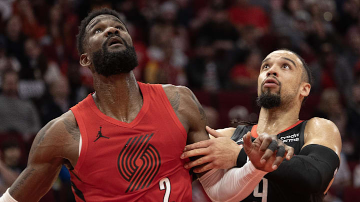 Jan 24, 2024; Houston, Texas, USA; Portland Trail Blazers center Deandre Ayton (2) tries to box out Houston Rockets forward Dillon Brooks (9) in the second quarter at Toyota Center. Mandatory Credit: Thomas Shea-USA TODAY Sports