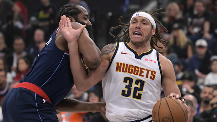 Apr 26, 2025; Inglewood, California, USA; Denver Nuggets forward Aaron Gordon (32) is defended by Los Angeles Clippers guard James Harden (1) as he drives to the basket in the first half of game four of round one of the 2024 NBA Playoffs at Intuit Dome. Mandatory Credit: Jayne Kamin-Oncea-Imagn Images