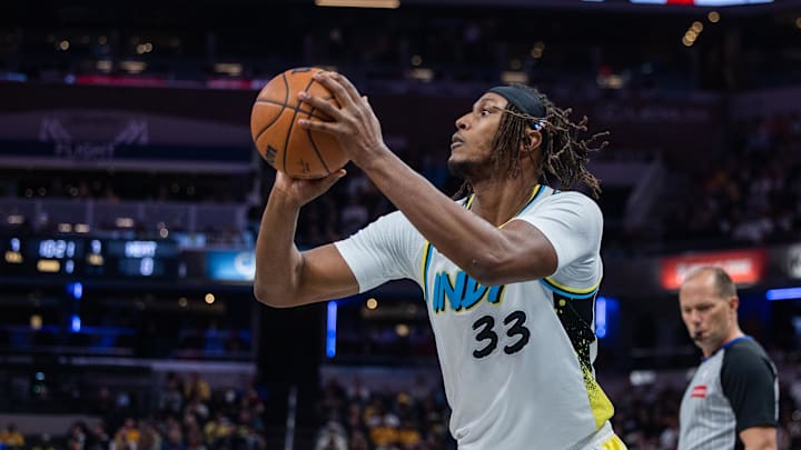 Nov 17, 2024; Indianapolis, Indiana, USA;  Indiana Pacers center Myles Turner (33) shoots the ball in the first quarter against the Miami Heat at Gainbridge Fieldhouse. Mandatory Credit: Trevor Ruszkowski-Imagn Images