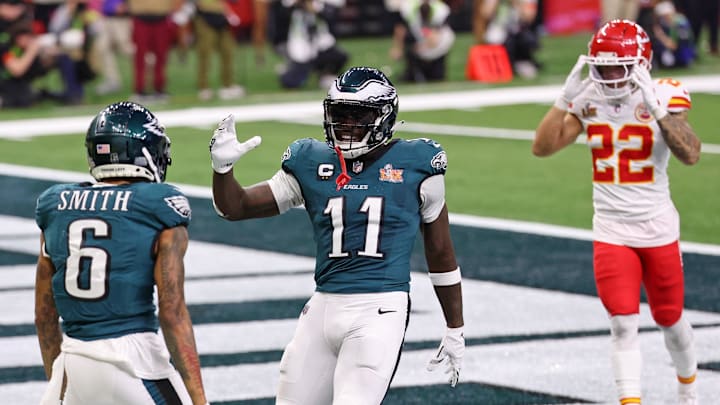 Feb 9, 2025; New Orleans, LA, USA; Philadelphia Eagles wide receiver A.J. Brown (11) congratulates wide receiver DeVonta Smith (6) after he scored a touchdown against the Kansas City Chiefs during the second half of Super Bowl LIX at Caesars Superdome. Mandatory Credit: Bill Streicher-Imagn Images
