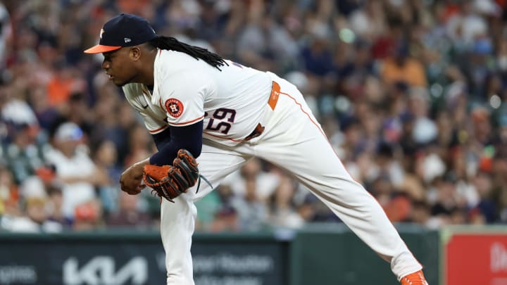 Jun 23, 2024; Houston, Texas, USA;  Houston Astros starting pitcher Framber Valdez (59) looks before pitches against the Baltimore Orioles in the first inning at Minute Maid Park. Mandatory Credit: Thomas Shea-USA TODAY Sports