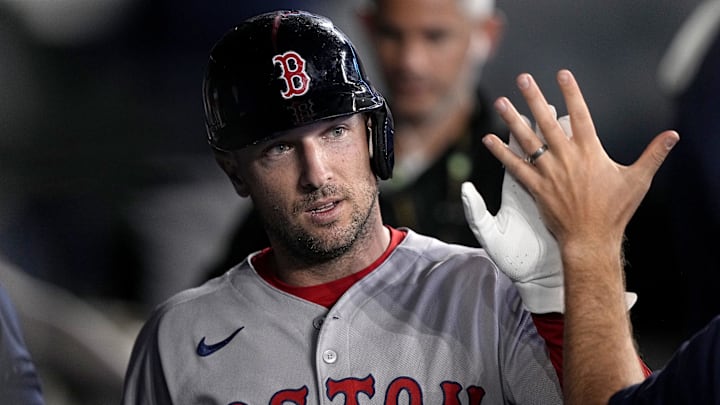 Apr 29, 2025; Toronto, Ontario, CAN; Boston Red Sox third baseman Alex Bregman (2) is congratulated after scoring against the Toronto Blue Jays during the ninth inning at Rogers Centre. Mandatory Credit: John E. Sokolowski-Imagn Images