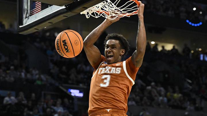 Texas Longhorns forward Dailyn Swain (3) dunks 