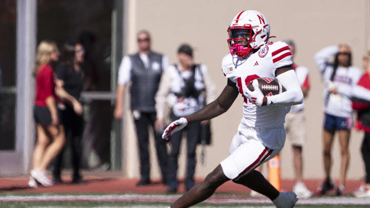 Oct 19, 2024; Bloomington, Indiana, USA; Nebraska Cornhuskers wide receiver Jaylen Lloyd (19) runs after a pass during the second quarter of a game against the Indiana Hoosiers at Memorial Stadium. Mandatory Credit: Jacob Musselman-Imagn Images Oct 19, 2024; Bloomington, Indiana, USA; Nebraska Cornhuskers wide receiver Jaylen Lloyd (19) runs after a pass during the second quarter of a game against the Indiana Hoosiers at Memorial Stadium. Mandatory Credit: Jacob Musselman-Imagn Images