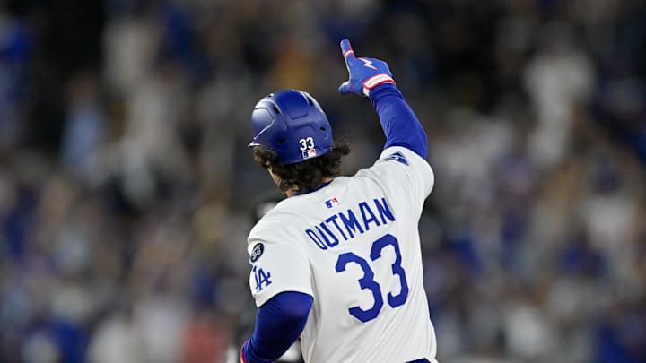 May 15, 2025; Los Angeles, California, USA; Los Angeles Dodgers center fielder James Outman (33) celebrates as he rounds the bases after hitting a solo home run against the Athletics during the sixth inning of the game at Dodger Stadium. Mandatory Credit: Jayne Kamin-Oncea-Imagn Images