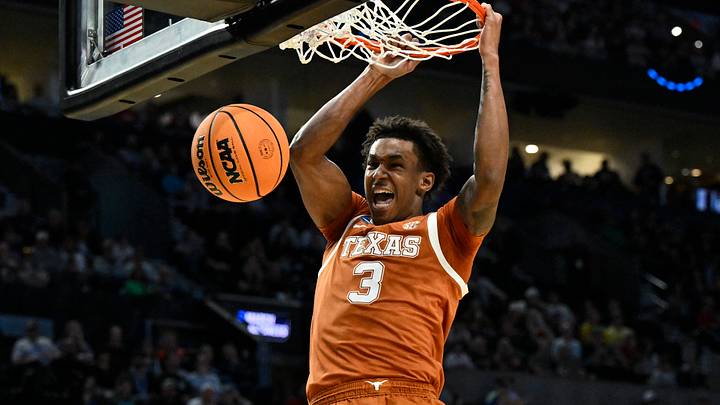 Mar 21, 2026; Portland, OR, USA; Texas Longhorns forward Dailyn Swain (3) dunks against the Gonzaga Bulldogs in the first half during a second round game of the men's 2026 NCAA Tournament at Moda Center. Mandatory Credit: Craig Strobeck-Imagn Images